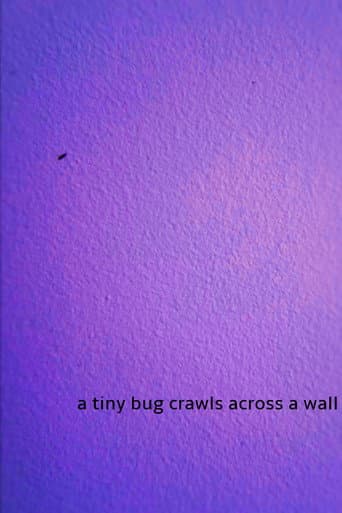 a tiny bug crawls across a wall poster